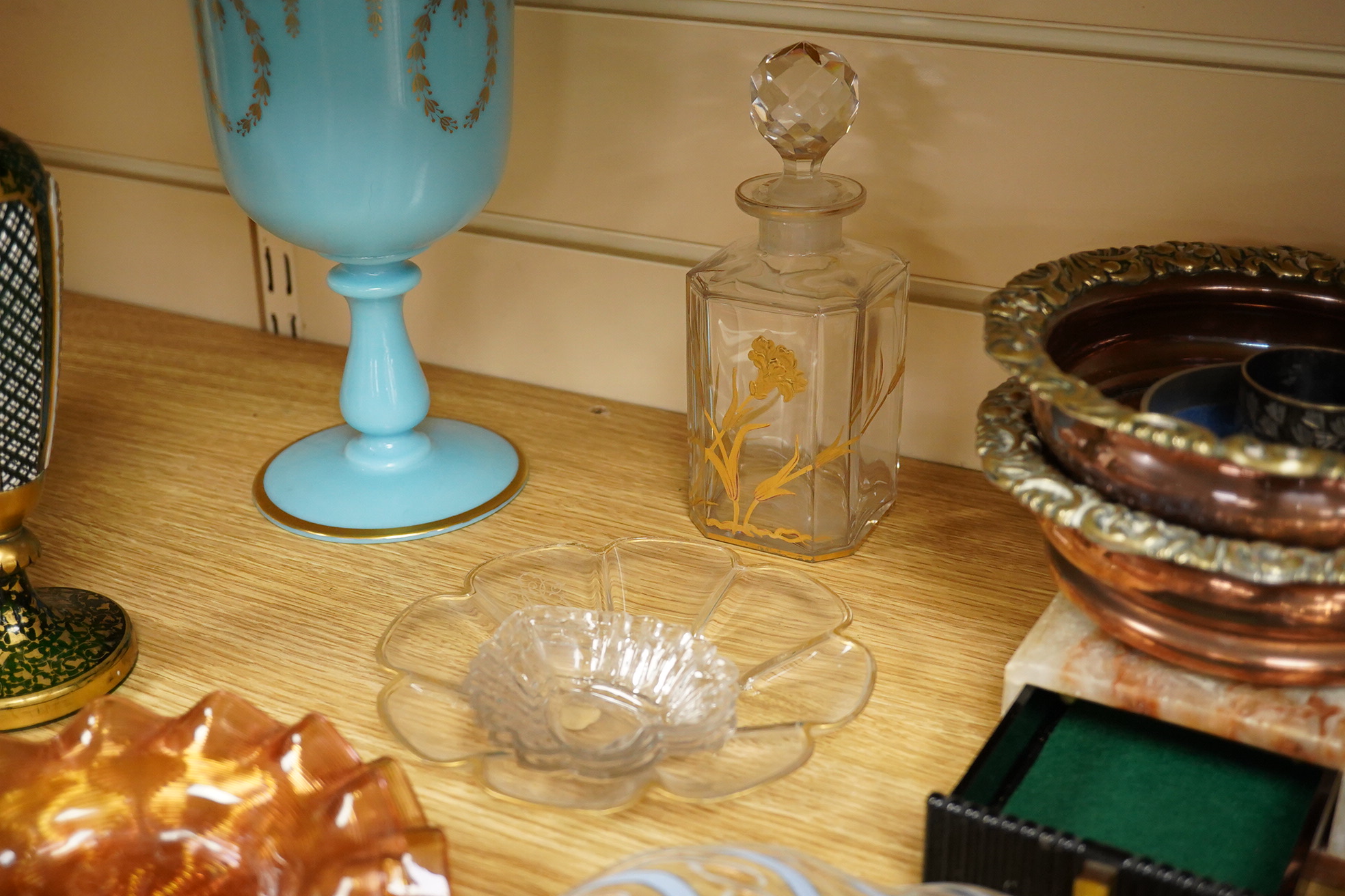 A Victorian gilt and enamelled green glass decanter, a similar vase, a small square decanter, Venetian dishes, silver plated coasters, etc